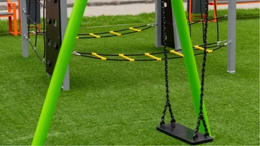 Professional base preparation for playground turf installation in Dallas